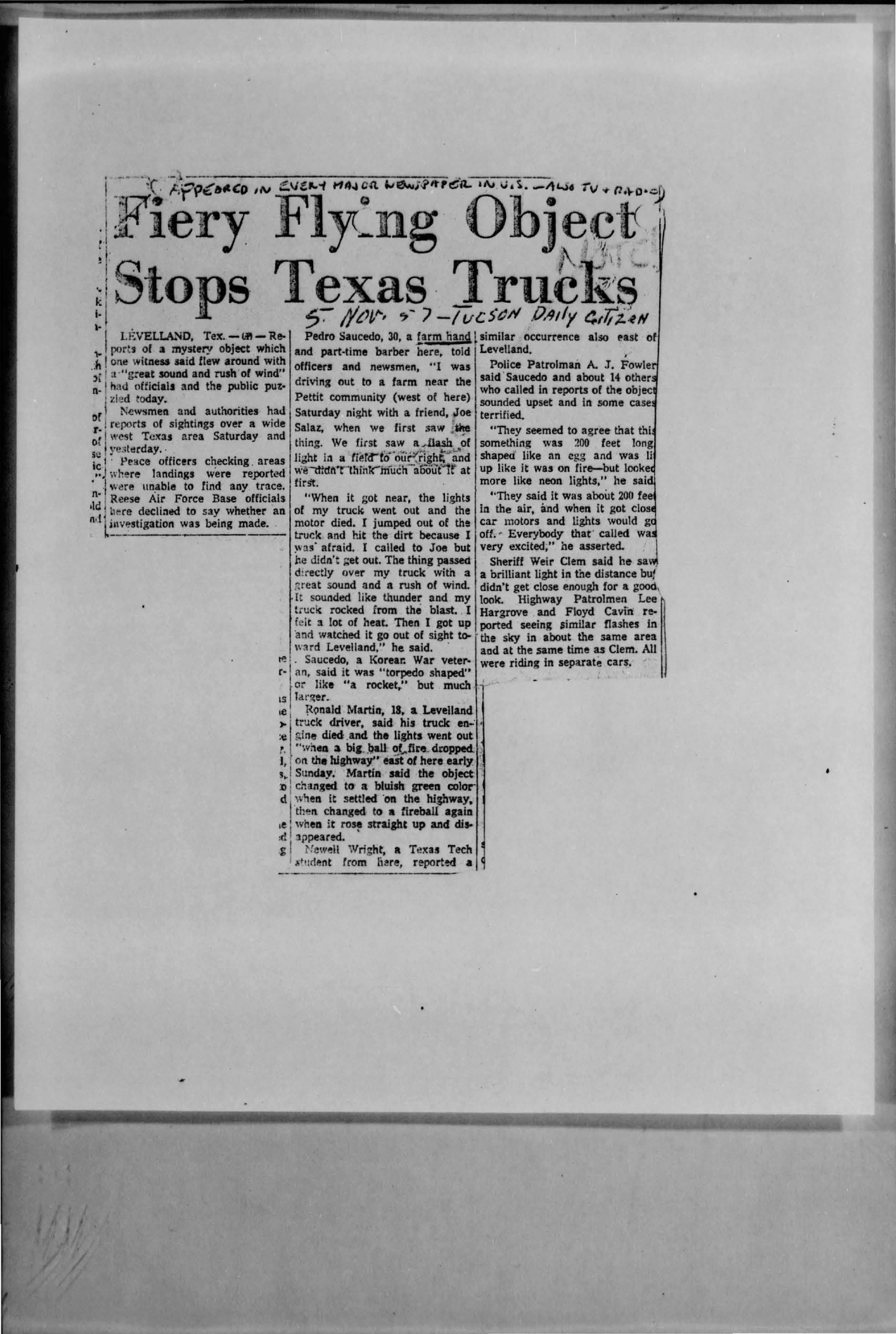 Contemporary Associated Press wire clipping inside the Blue Book file, headlined "Fiery Flying Object Stops Texas Trucks," as printed in the Tucson Daily Citizen, 5 November 1957. It carries Pedro Saucedo's signed account, Patrolman A. J. Fowler's statement that Saucedo and "about 14 other" people called in, and Sheriff Weir Clem's report. Real period newspaper, not a recreation.