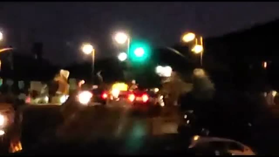 Traffic gridlocked leaving the amphitheatre off I-80 on the night of 21 August 2004, one of the vantage points from which the red lights were watched. Still from witness video shown in "The Lights."