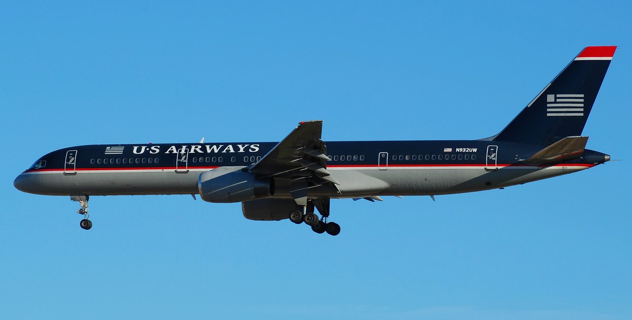 Red Disk Passes a US Airways Jet