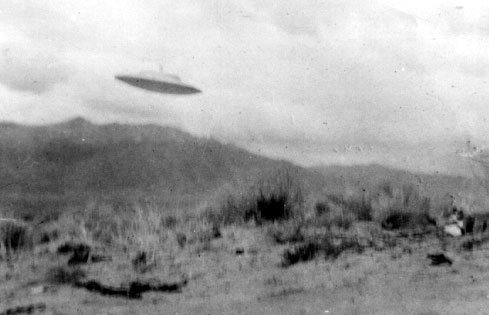 Another frame from the Easter Sunday 1965 series. Blue Book's analysis put the saucer at about 20 inches across, photographed close to the camera.